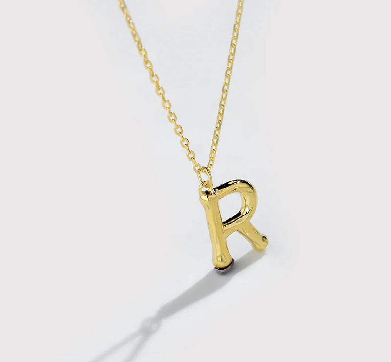 GLOBE LETTER NECKLACE